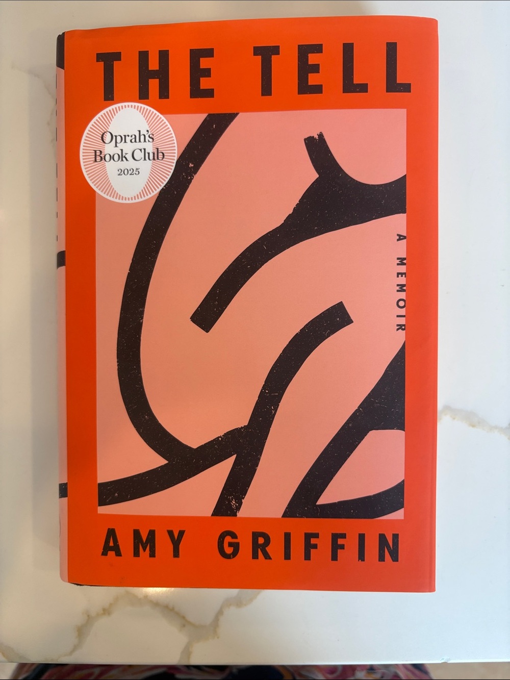 The Tell by Amy Griffin - Bright Coral & Black Cover
